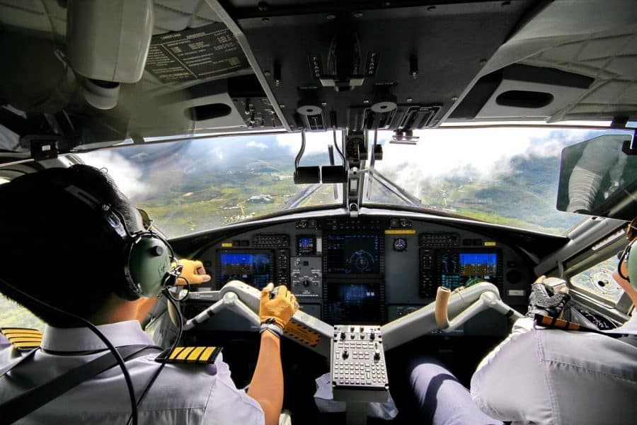 pilot and co-pilot in cockpit